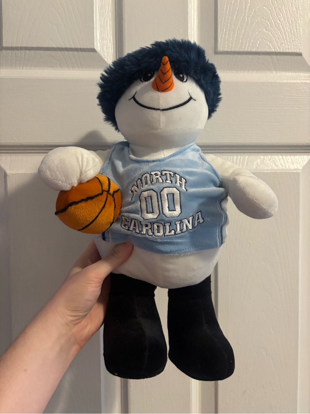North Carolina Blue Snowman Plush with Basketball holiday decor